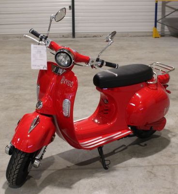 un scooter rouge garé dans un garage