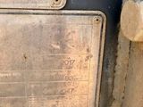 a close up of a metal plate on a wall