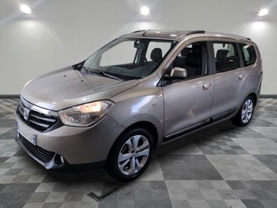 a picture of a silver car parked on a checkered floor