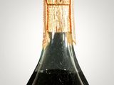 a bottle of wine that is sitting on a table