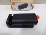 a box with a black battery in it on a table
