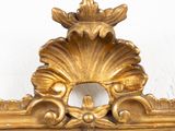 a gold frame with a picture of a bird on it