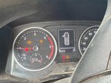 a close up of a car dashboard with a speedometer