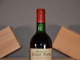 a bottle of wine that is sitting on a table