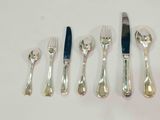 five forks, a knife, a spoon, and a knife on a table