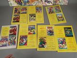 a box of comics on a table with a person holding a mouse