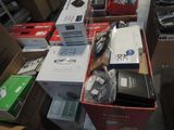 many boxes of electronic devices sitting on the floor