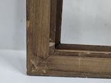 an old wooden frame with a white background and a white background