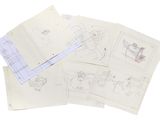 a lot of drawings on top of a sheet of paper
