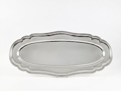 a silver plate with a decorative design on the edge