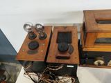 two speakers sitting on top of a table next to each other