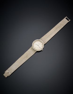 an 18k gold and diamond wristwatch, by cartier