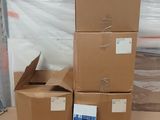 several boxes are stacked on top of each other in a warehouse