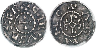 an image of two silver coins, one of which has a design on it