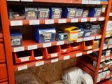 a shelf with many different types of tools in it