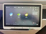 a monitor on the back of an airplane that is on display