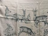 an image of a scarf with deers and rabbits on it