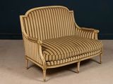 an image of a chair with a striped upholstered back