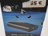 the box for the game capture hd is open and ready to be used