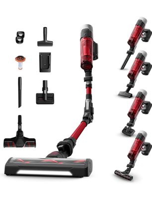 un gros plan sur un aspirateur rouge et d'autres accessoires