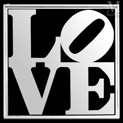 a close up of a white love sign on a black background