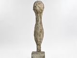 an image of a sculpture of a woman ' s torso on a block