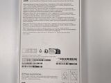 the back of a white box with a black label on it