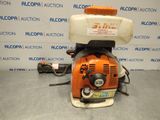 an orange and white blower sitting on top of a table