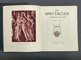 an open book with a picture of a woman in a dress on it