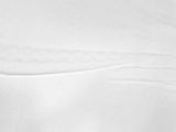 a black and white photo of a snowboarder in the snow