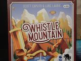 a board game called whistle mountain on the table