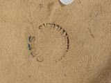 an image of a close up of a vase with a tag on it