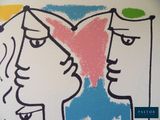 a drawing of a man and a woman facing each other