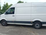 a white van that is parked in a parking lot