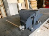 an image of a vise on a workbench in a workshop