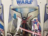 three star wars action figures are on display in a store