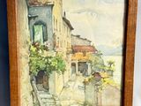 framed watercolor painting of a street scene in a small town