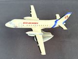 a model of an airplane that is on a table