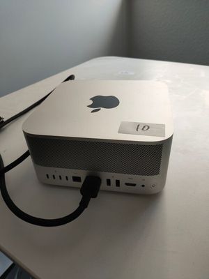 an apple computer sitting on top of a table