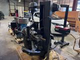 a machine that is sitting on a pallet in a garage
