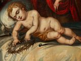 a painting of a baby laying on a bed with a crown of thorns