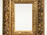 an ornate gold frame with a white background