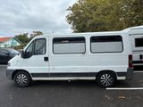 a white van that is parked in a parking lot