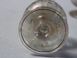 a close up of a glass object on a table