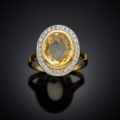 a yellow sapphire and diamond ring