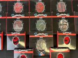 a lot of watches that are sitting on a table