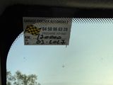 a sticker on the window of a car that says garage control automobile