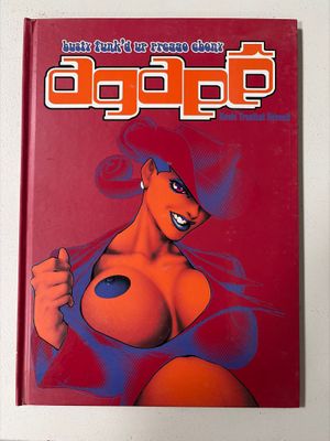 une image représentant un livre rouge sur lequel figure un personnage de bande dessinée