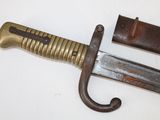 a knife that is laying on a table