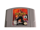 the game boy ' s nintendo game duke nuken is on a white surface
